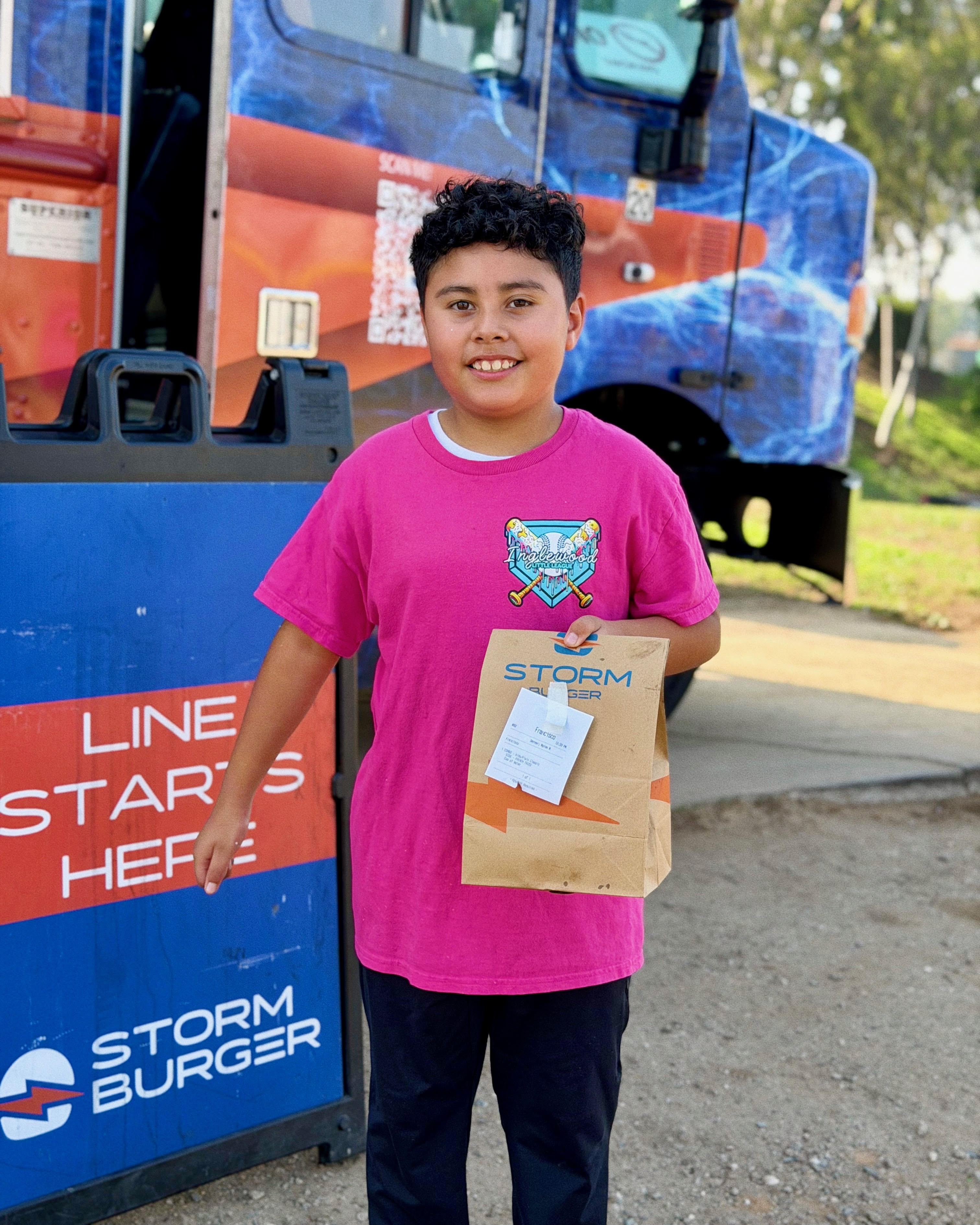 Young guest enjoying Storm Burger